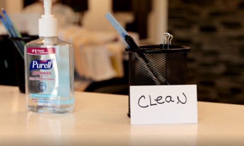 Sanitize and Pen holder at Desk